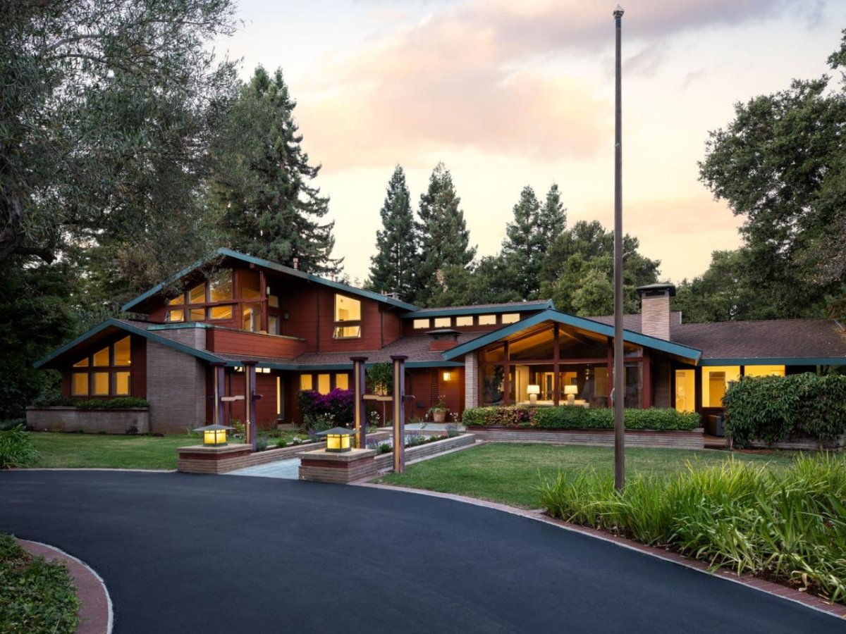 Luxury home at 47 Manzanita Rd in Atherton, California, surrounded by mature trees and lush landscaping