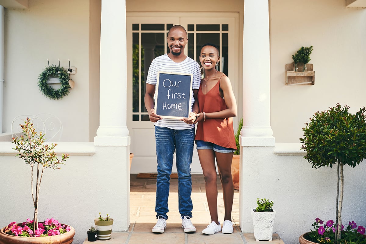 Couple buying their first home in Northern Indiana with guidance from realtor Berto Barrera.