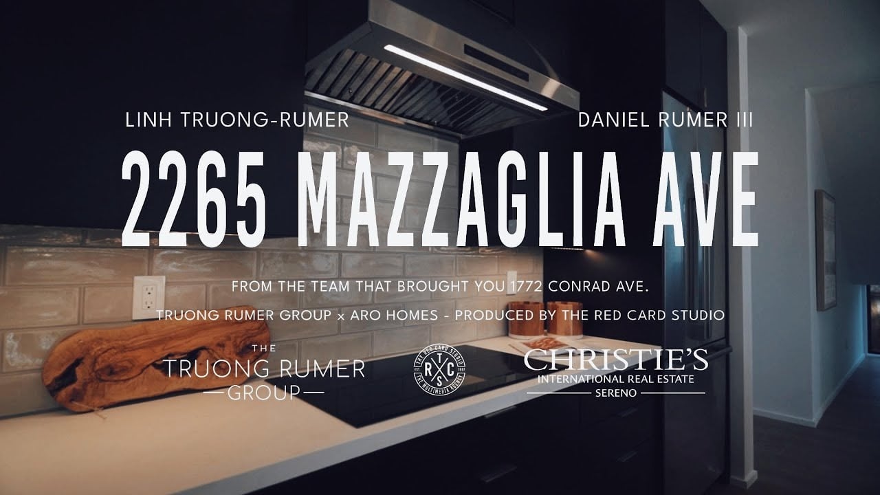 2265 Mazzaglia Ave real estate film title card over a modern kitchen.