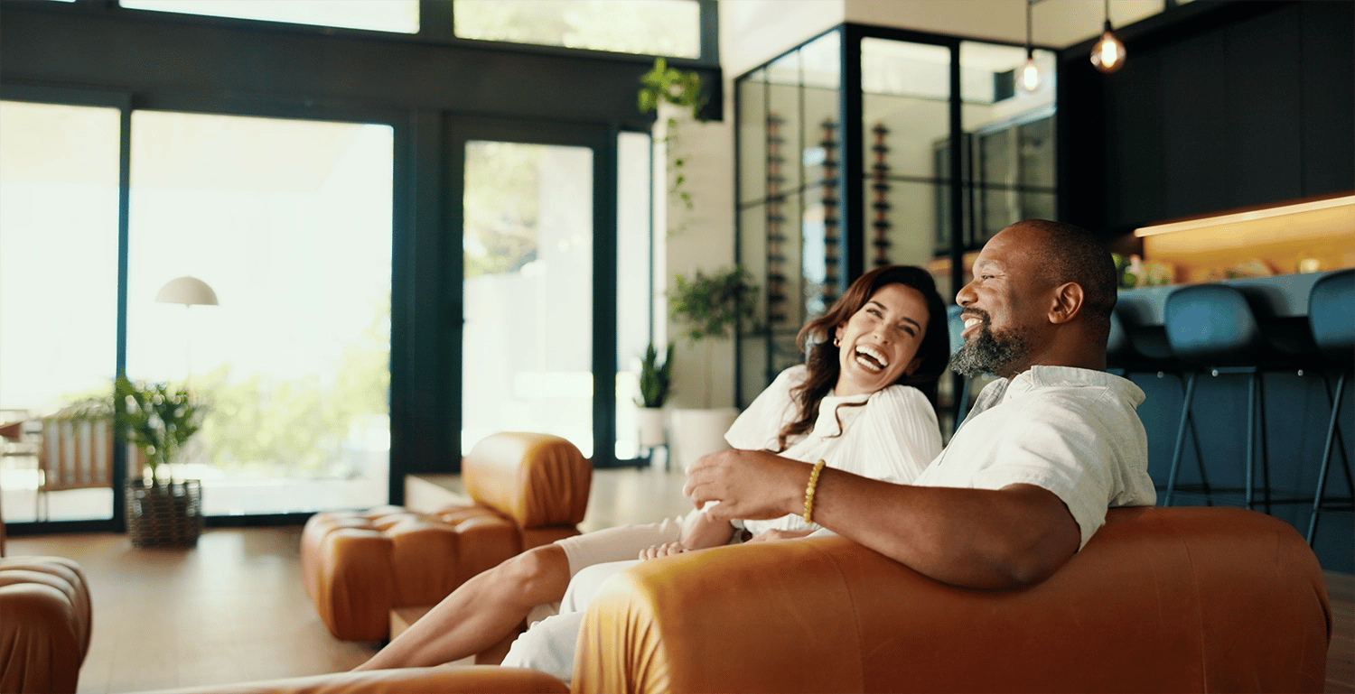 happy couple in living room