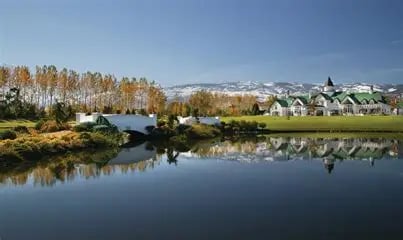 Historic Rancharrah estate overlooking the pond and landscaped grounds in Reno, Nevada.