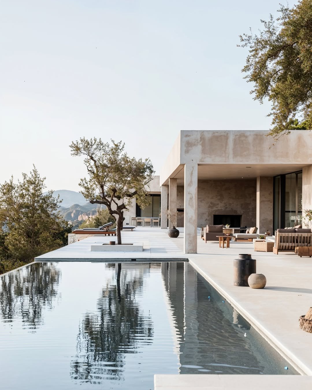 Modern luxury home with minimalist architecture and infinity pool, styled by Agency West - Amy Ali