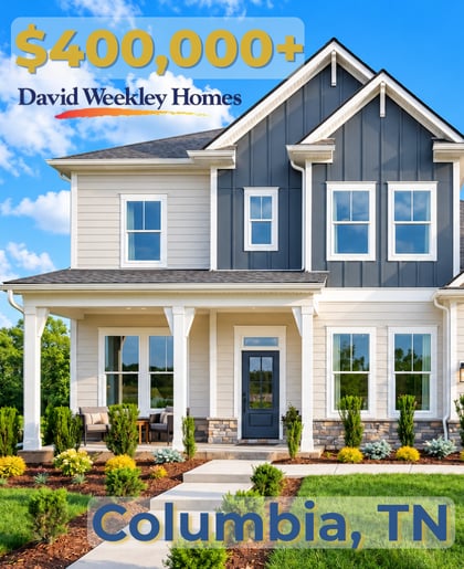 Two-story Columbia home with dark gables, a covered porch, and landscaped garden beds.