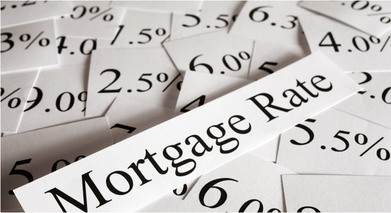 Mortgage rate text surrounded by printed interest-rate percentages.