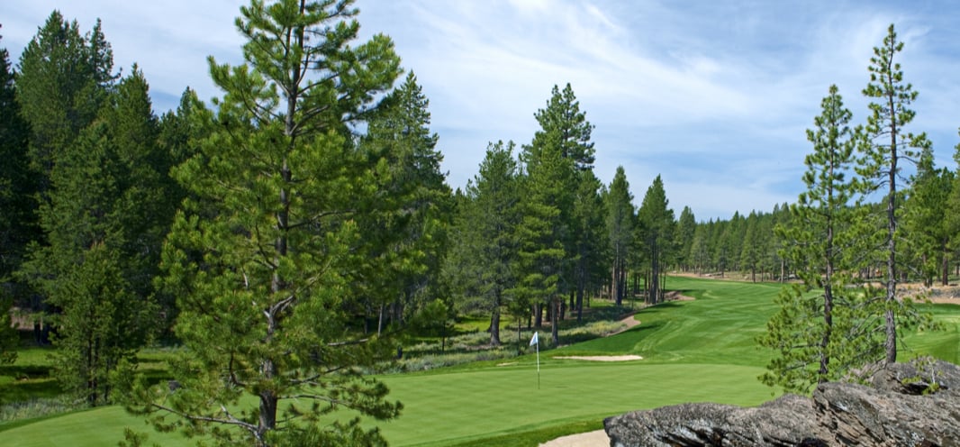Aerial view of Schaffer’s Mill and Grays Crossing communities in Truckee, CA with mountain views and golf courses.
