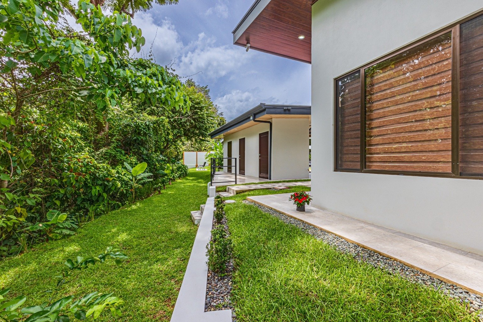 Incredible turnkey investment opportunity, 3 Rental villas, and a 2 Bedroom Home with a large pool.