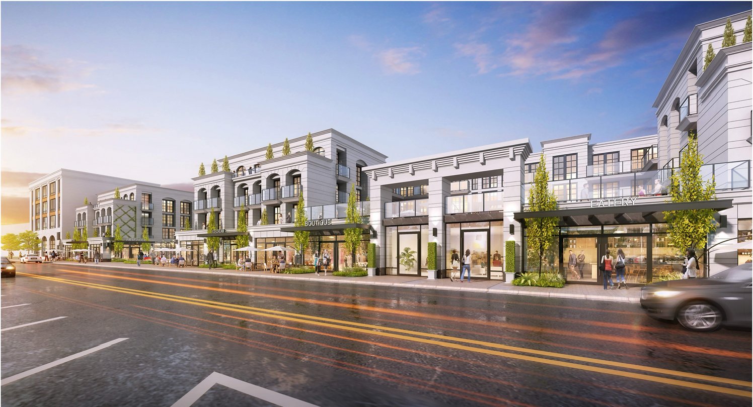 Mixed-use development with boutique and eatery storefronts, balconies, and street-level landscaping.