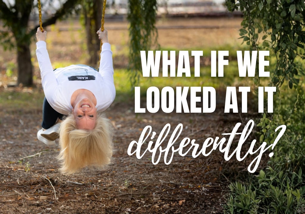 Sharla Ellis hanging upside down on a swing with “What if we looked at it differently?” for a blog about mortgage options for self-employed borrowers and real estate investors.