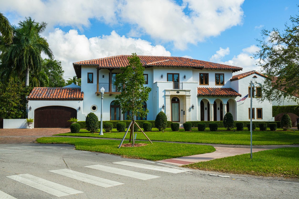 Holmby Hills luxury home with Spanish Revival design and lush estate grounds.