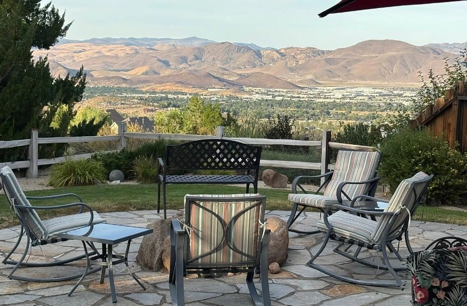 South Reno backyard with trimmed landscaping, defined seating areas, and clean patio to appeal to buyers in 89521.