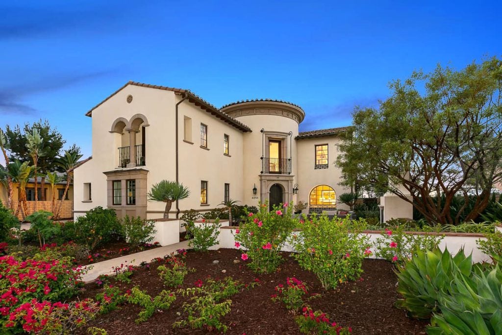 Spanish-style luxury home with Mediterranean architecture and landscaped garden in Southern California, featured by Amy Ali of Agency West