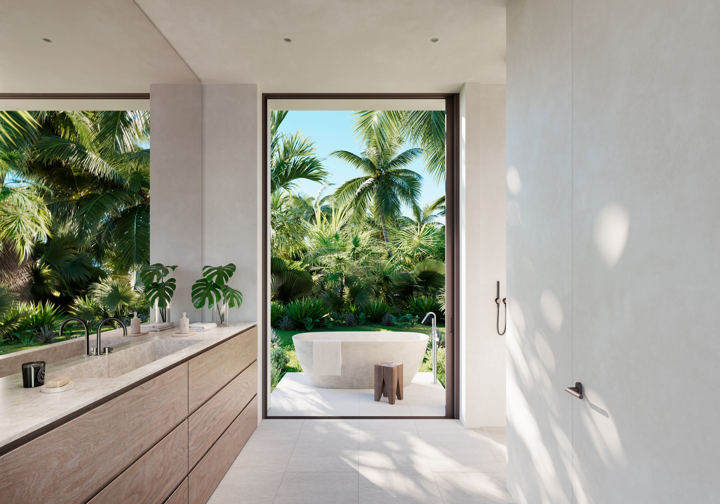 Rendering of a bathroom with a freestanding tub and garden view at Banyan Tree Residences Bimini