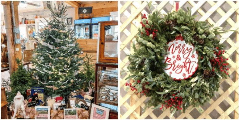 Decorated Christmas tree in a shop beside a berry-trimmed wreath reading “Merry & Bright.”