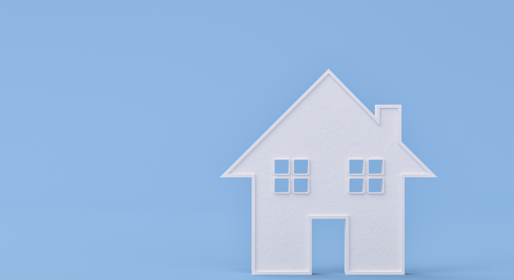 A white house set against a vibrant blue background, creating a striking visual contrast.