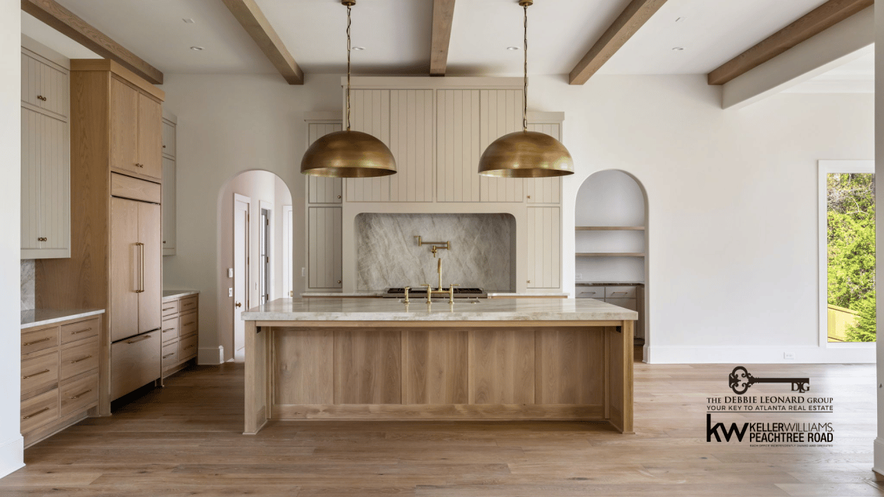 Custom interior finishes in a luxury Atlanta home including high-end marble and architectural millwork representing bespoke real estate valuation factors