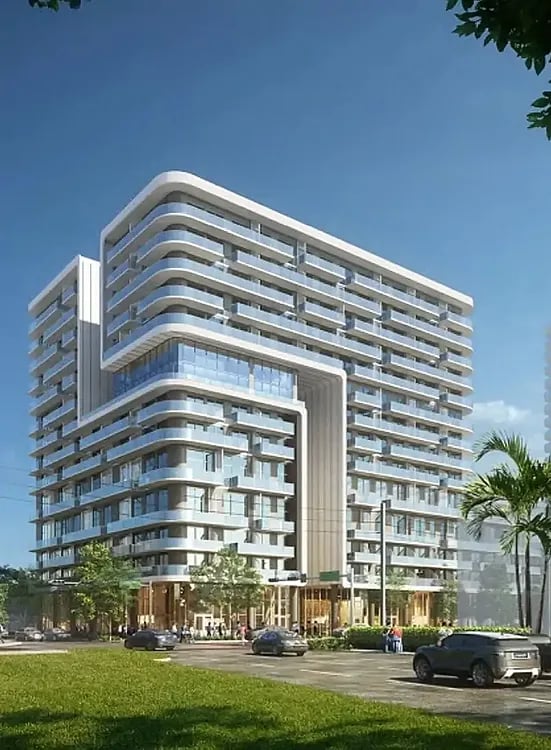 NoBe PARC residential tower with curved balconies and a prominent central entrance.