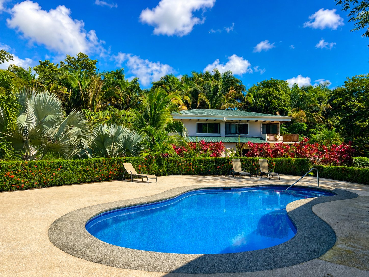 Remodeled Beach-Style Villa with Lush Jungle Setting
