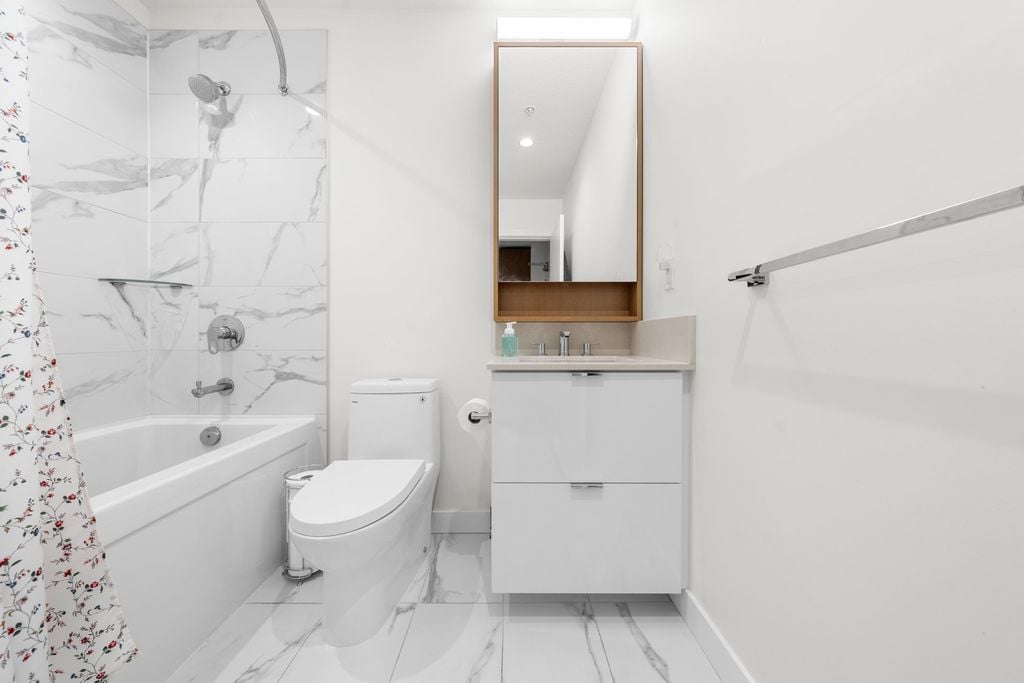 108 E 8th St, #214