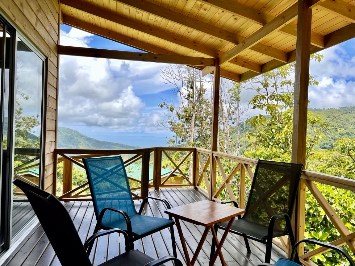 Eco-Luxury Home and Cabins with Waterfall, Ocean Views, and Organic Farming Potential