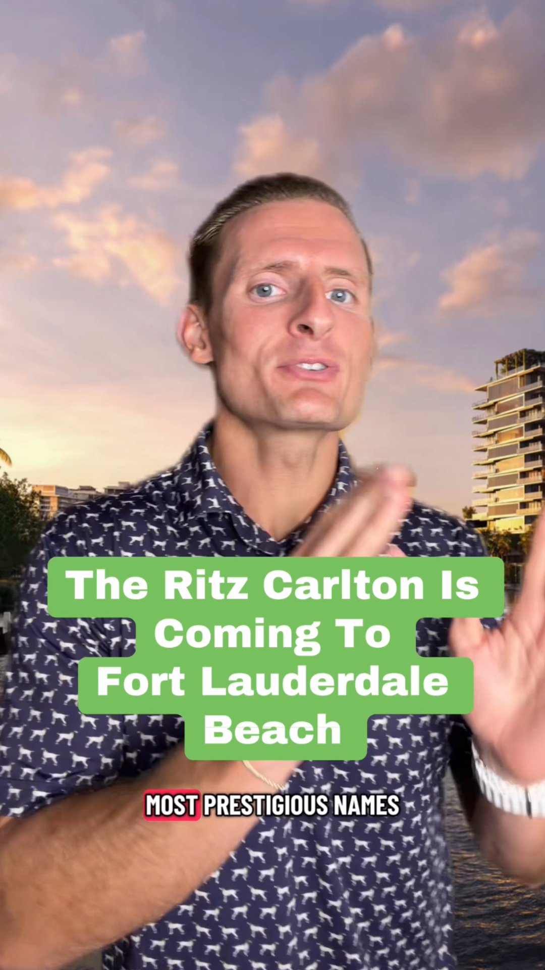 The Ritz-Carlton is coming to Fort Lauderdale Beach, announced by a man gesturing beside a waterfront building.