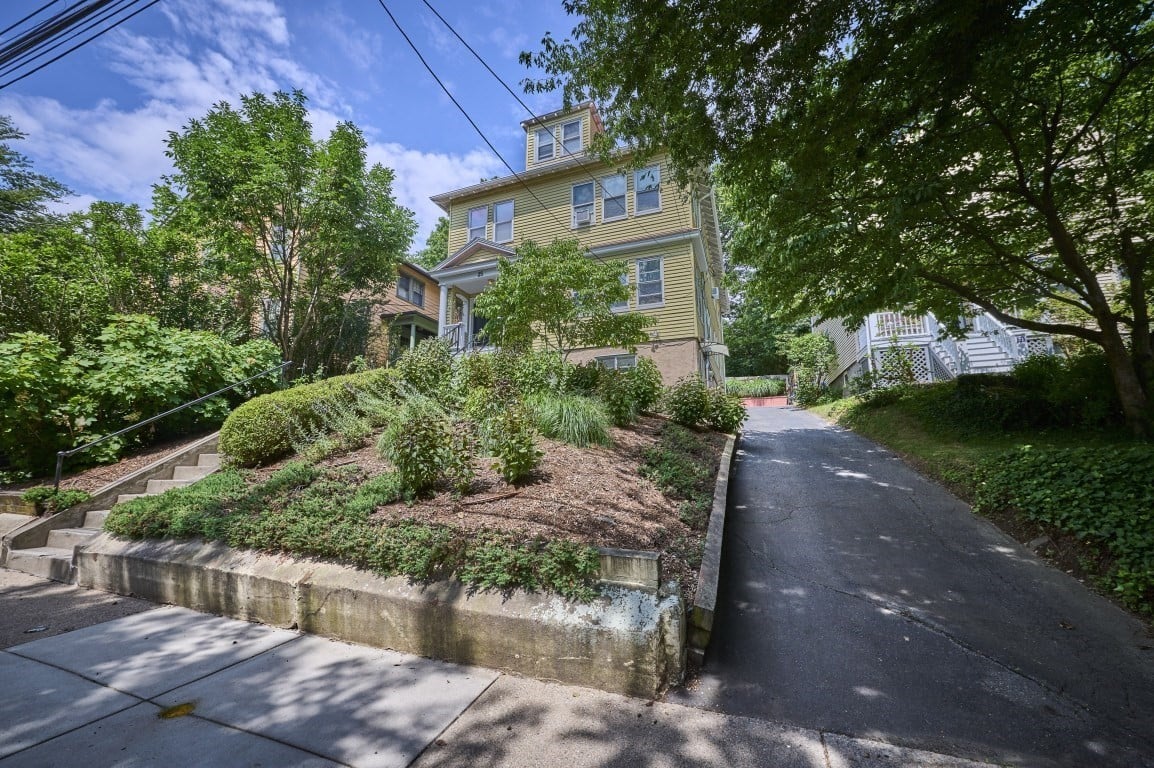 A Rare Two-Family Generational Asset with a Private Entrance to the Arnold Arboretum