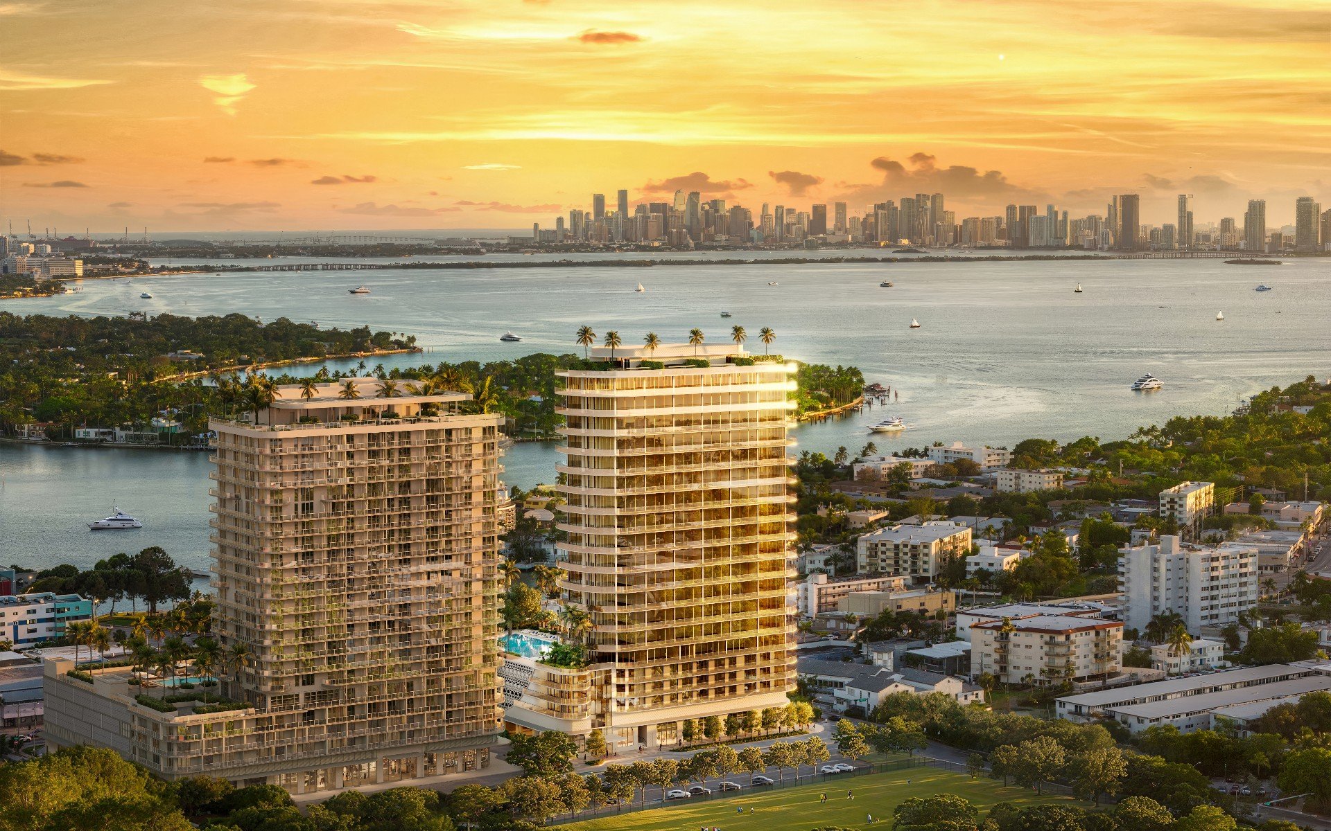 Rendering of 72 Carlyle overlooking the bay and the Miami skyline at sunset