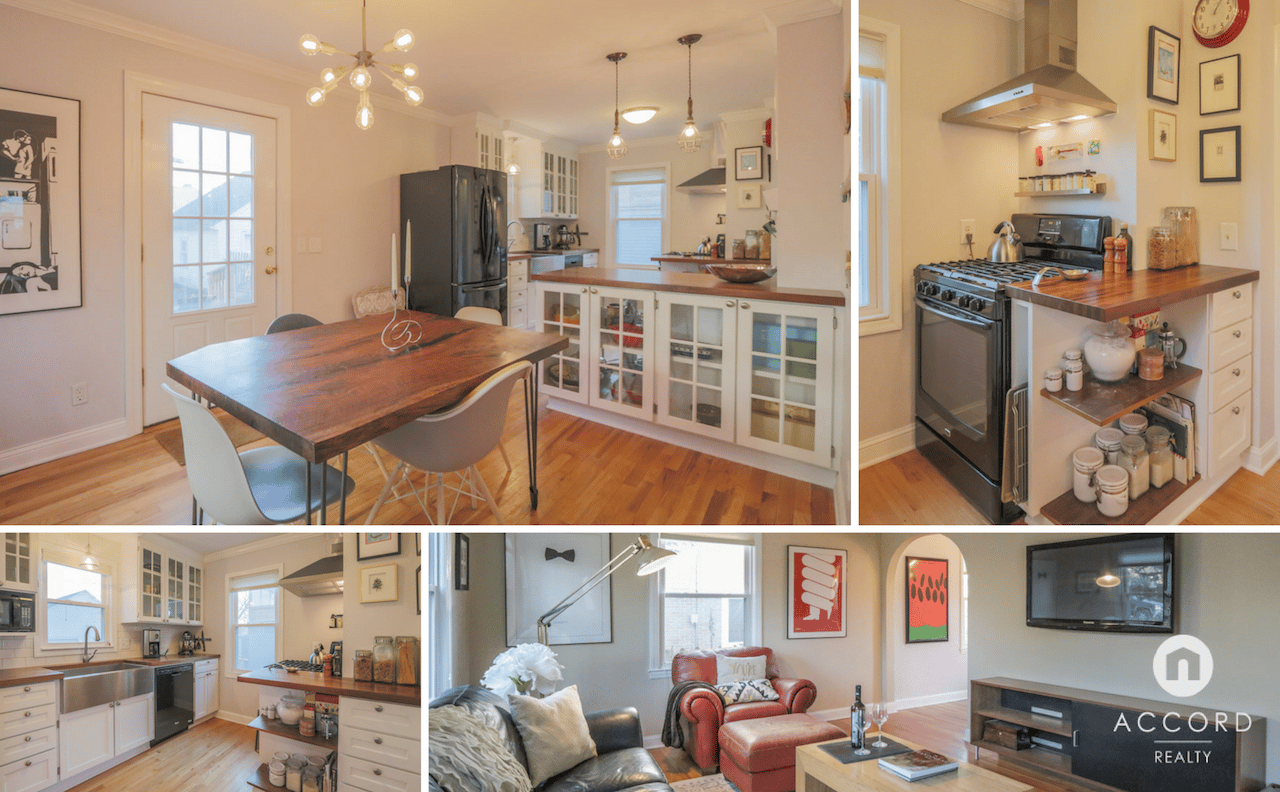 Furnished kitchen with white cabinetry, a wood dining table, and a stainless gas range.