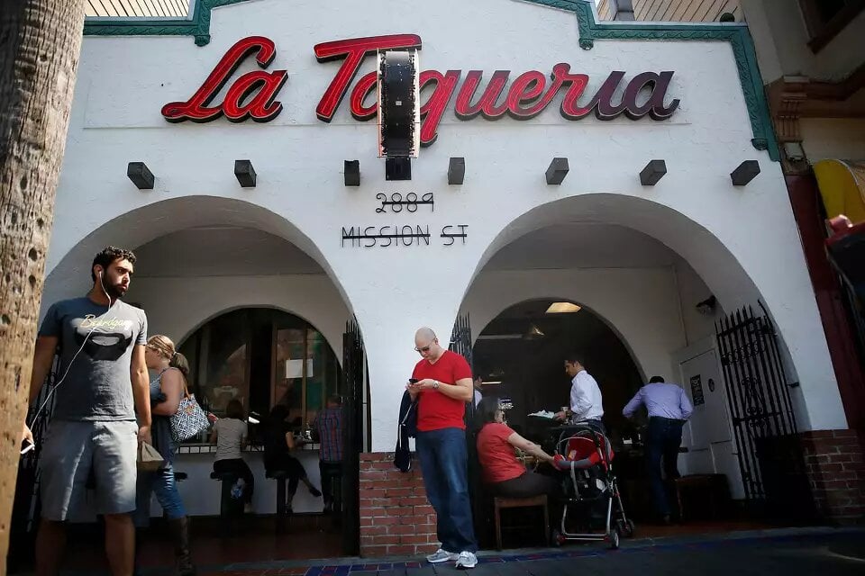 Crispy tacos and vibrant salsa served at La Taqueria in the Mission District, San Francisco.