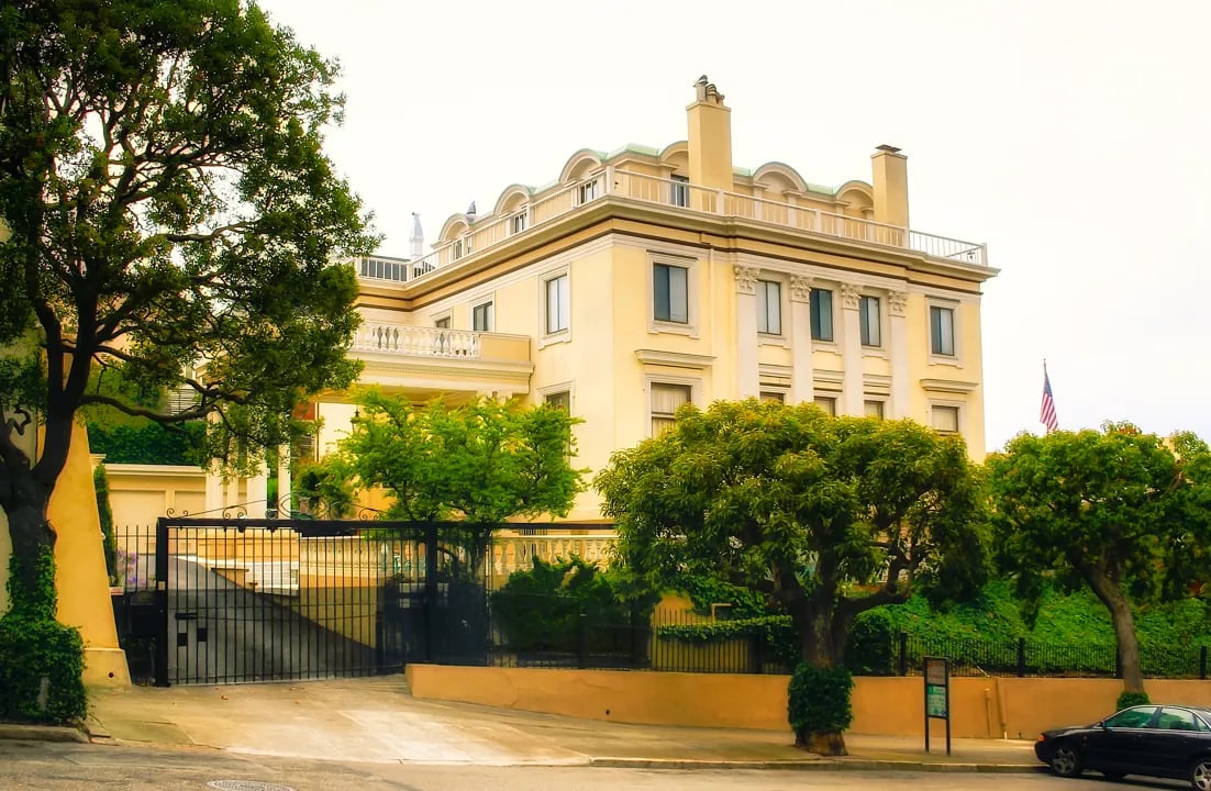 Luxury mansion with neoclassical architecture behind gates in Pacific Heights San Francisco California
