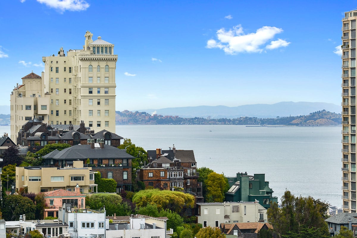 What Are the Key Differences Between Nob Hill Condos and Stock Cooperatives?