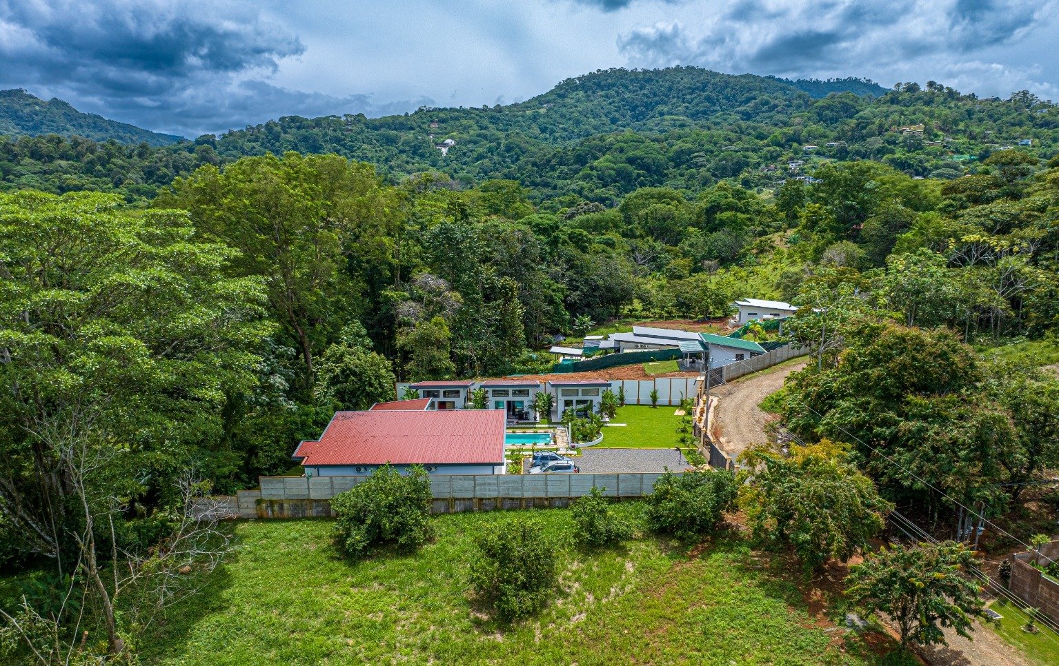 Incredible turnkey investment opportunity, 3 Rental villas, and a 2 Bedroom Home with a large pool.