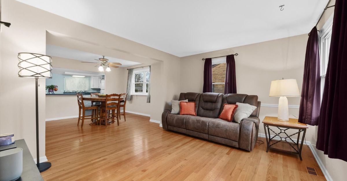 Bright open living space with hardwood floors and dining area at 4217 Elm St Downers Grove IL 60515 listed by the Tully Team