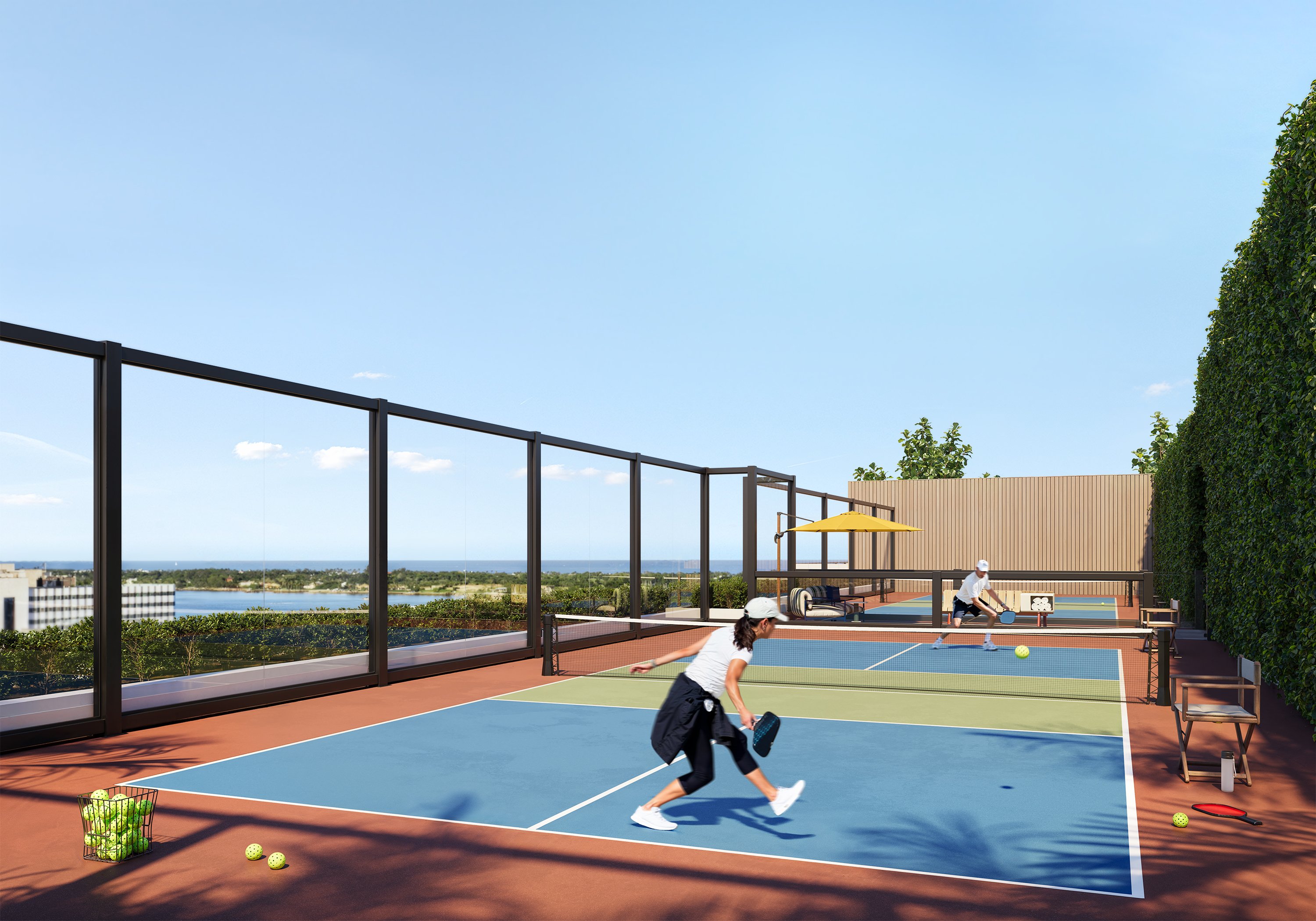 Rendering of the Nora House rooftop pickleball courts with coastal water views