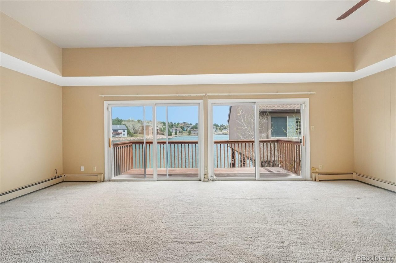 Lake Woodmoor Investor Special – Rare 1-Bed Lakeside Townhome with Huge Upside