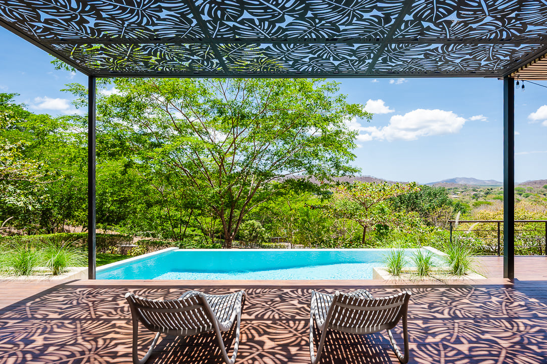 Casa Kalachuchi | Gorgeous Modern Jungle Oasis with Sunset Views in Gated Community