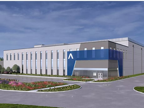Rendering of the DFW-04 data center in Plano, Texas, a modern three-story facility with Aligned Data Centers branding and landscaped surroundings.