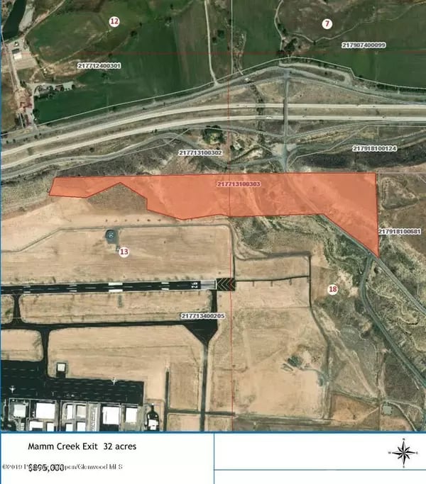Mamm Creek Exit 32-acre parcel map, with the property outlined in orange beside a highway interchange.