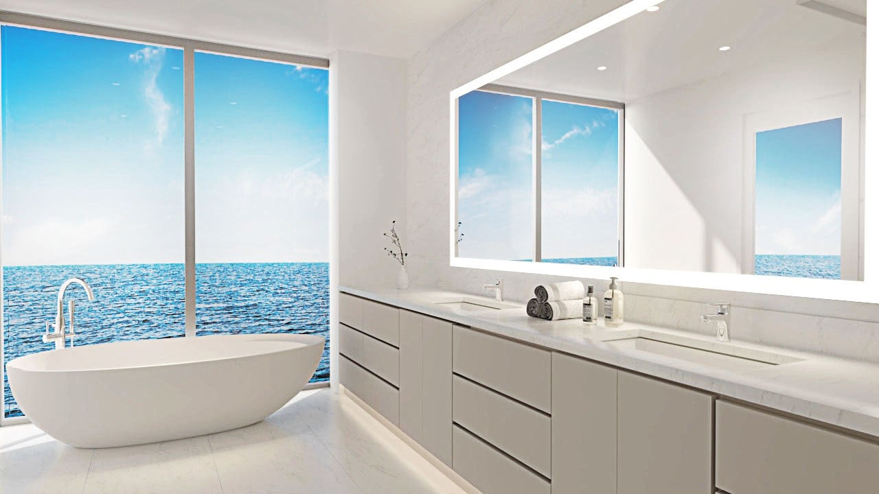 Ocean 580 residence bathroom rendering with a double vanity and ocean view.