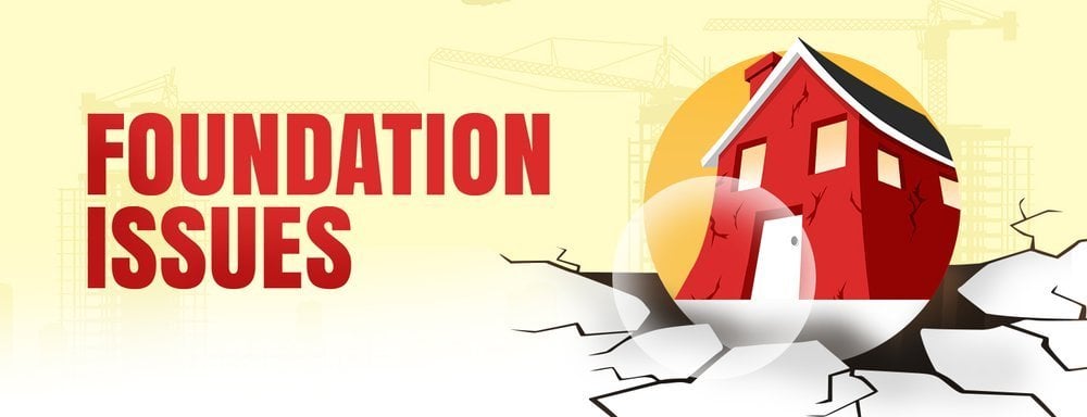 Cracked red house above fractured ground, illustrating foundation issues.