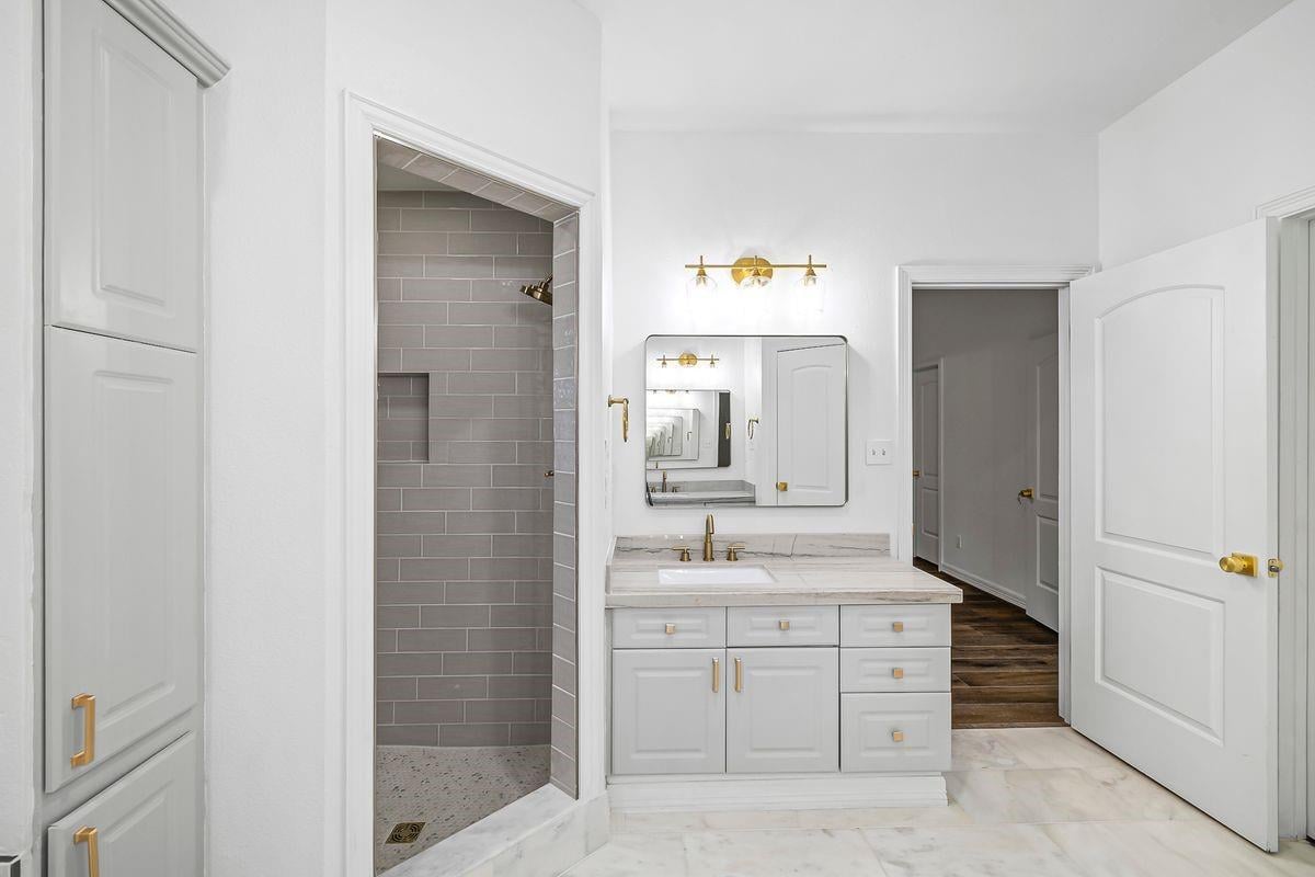 Primary bath walk-in shower and vanity, Barton Hollow, Westlake, Austin.