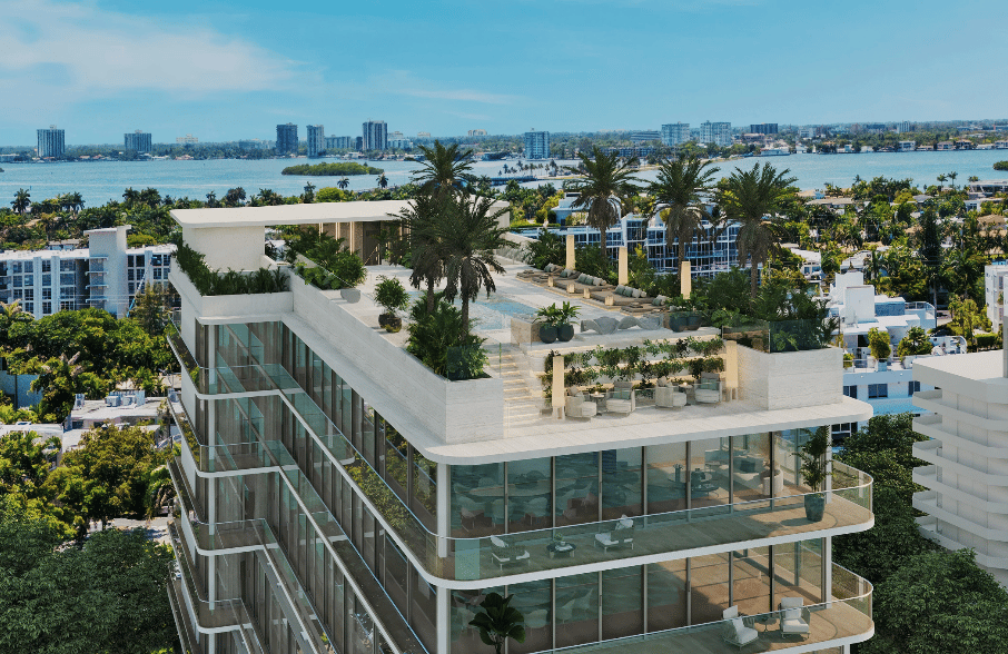 La Maré Bay Collection condominium with rooftop terrace and pool overlooking the bay and distant skyline.