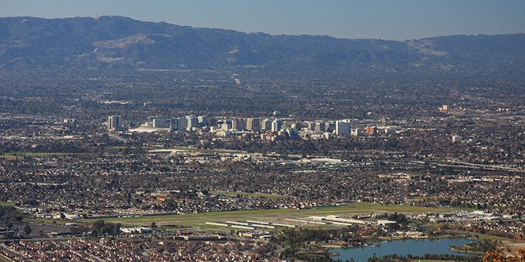 Panoramic view of North San Jose, with the city spread beneath distant mountains.