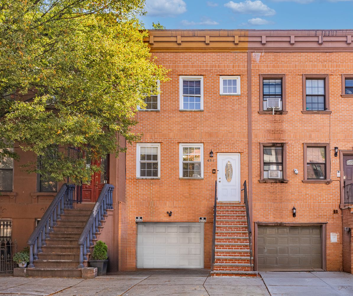 434 Lexington Ave Brooklyn NY two family brick townhouse in Bedford Stuyvesant sold by Parviz Latipzoda Compass featuring garage and multiple units