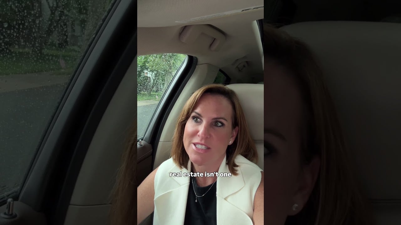 Melissa Infanzon speaking in a car, wearing a white sleeveless vest.