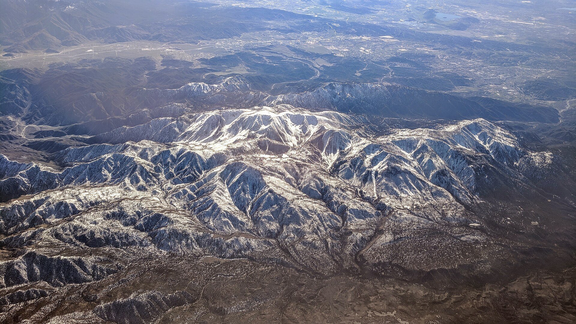 Snow-covered Mount San Gorgonio with Banning and the San Gorgonio Pass beyond, viewed from the north