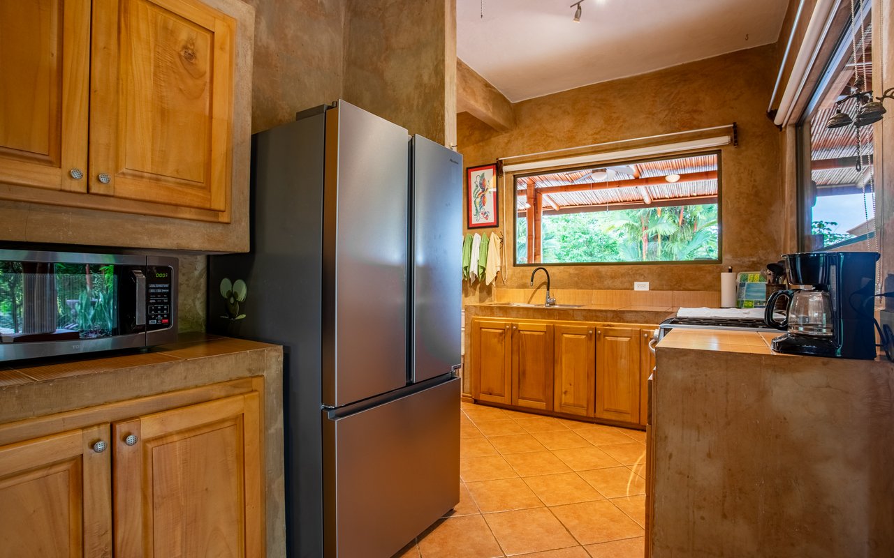 Tropical Getaway with Two Villas and Lush Gardens Near the Heart of Uvita