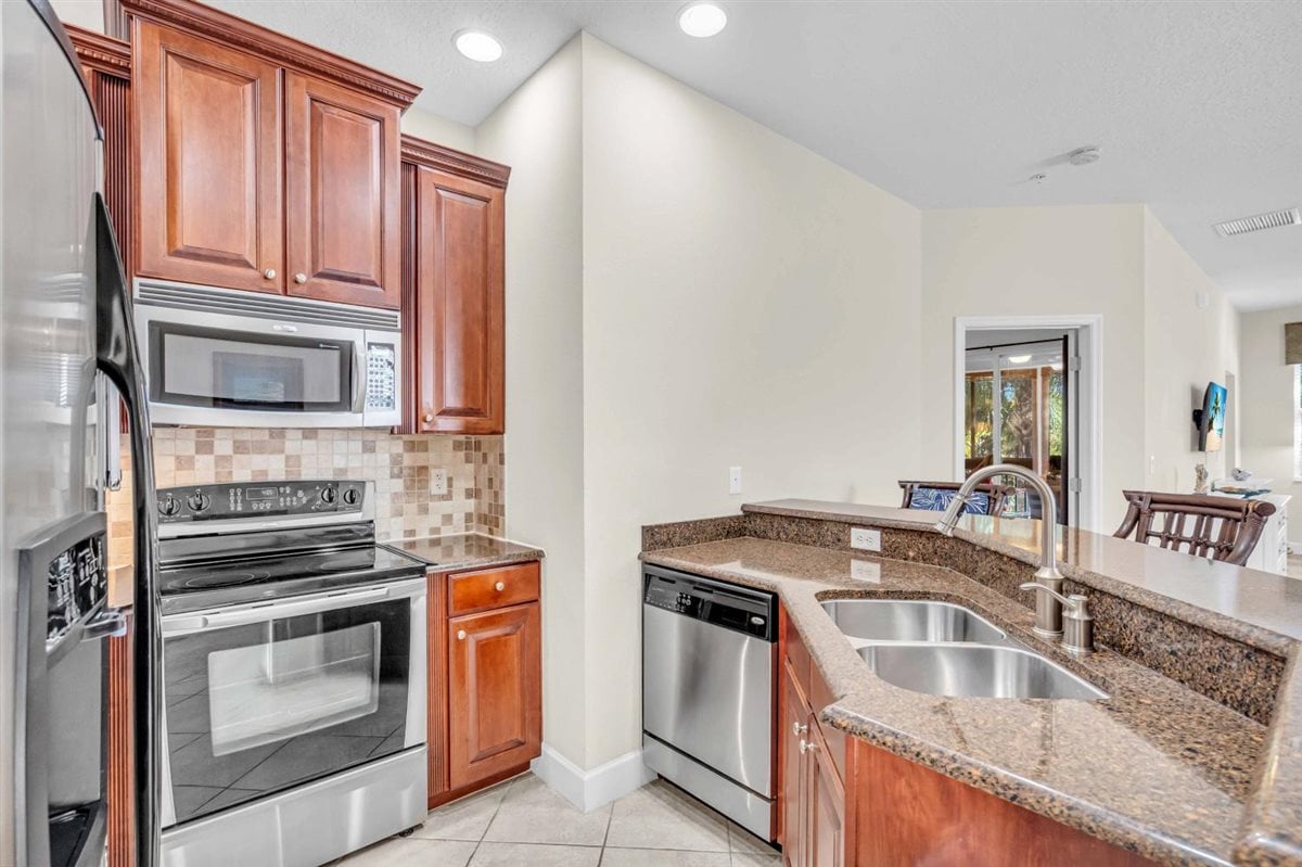 Plenty of Cabinet Space and Peace of Mind with State-of-the-art Stainless Steel Appliances 