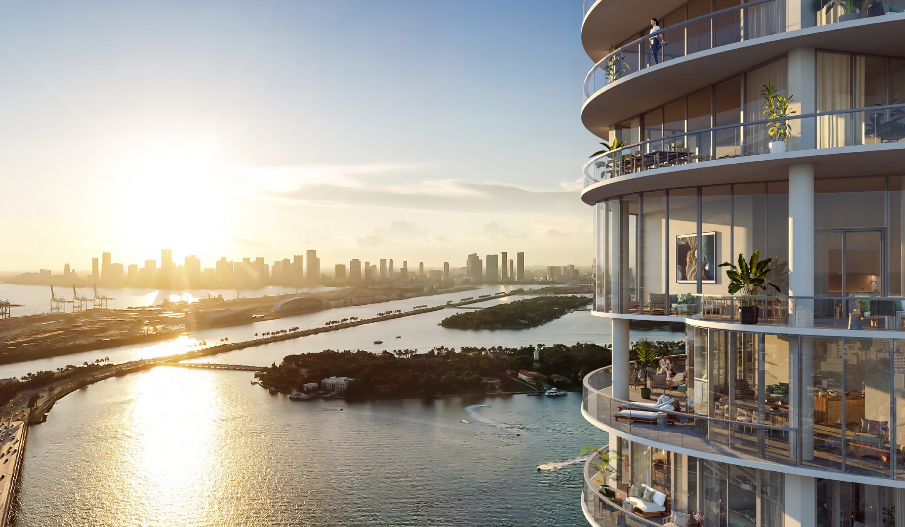 Rendering of Five Park overlooking the water and the Miami skyline at sunset