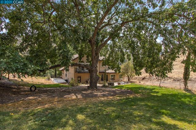 Gated and Spacious Spanish-Style Estate w/ ADU and Lots of Acreage