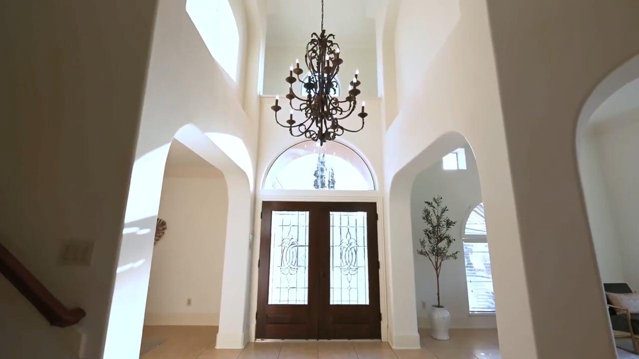 Tour a Luxurious Lakefront Home with Stunning Views at 13518 Indigo Lake